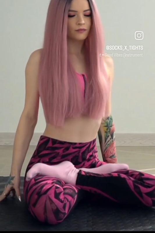 Stretching on the mat in pink socks - FULL MOVIE